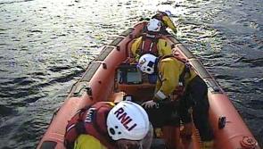 Search launched for three people and their dog 