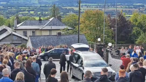 Girl who died in Clonmel crash arrives at church in white coffin as hundreds gather