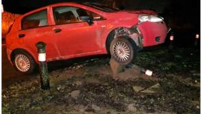 Driver charged under suspicion of intoxicated driving following collision with bollard