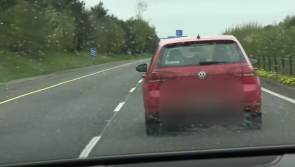 WATCH: Driver caught on phone 'not paying attention at all' in Garda video