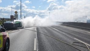 BREAKING: Car catches fire on M50 as Fire Brigade tackle blaze on southbound junction