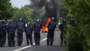 Garda hospitalised and man (20s) arrested at Coolock protest as rocks and bricks thrown