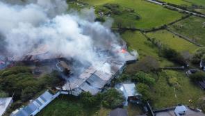 Watch: Fire destroys the historic Famine Village on County Donegal's Isle of Doagh 