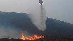 Helicopters and drones being used in aerial monitoring as fire threat warning is issued