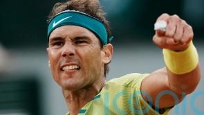 Rafael Nadal battles through to earn Novak Djokovic quarter-final at French Open