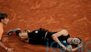 Rafael Nadal reaches French Open final after Alexander Zverev injured in fall