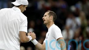 Andy Murray knocked out of Wimbledon by big-serving John Isner