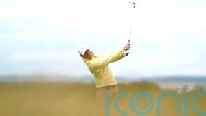 The Open day two: Rory McIlroy eager to build on promising start