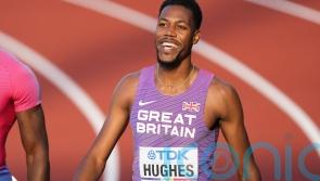 Zharnel Hughes into World Championship semi-finals after finishing second