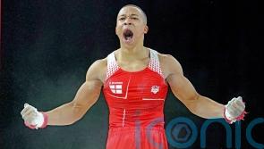 Joe Fraser battles through pain barrier to help England win team gymnastics gold