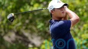 Si Woo Kim flies high with 18th-hole eagle to share FedEx lead with JJ Spaun