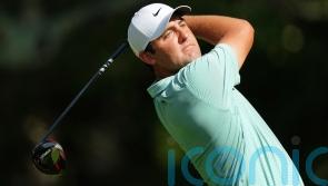 Scottie Scheffler maintains one-shot lead as storms hit Tour Championship