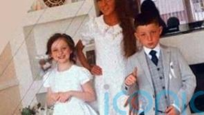 Flowers and candles at Tallaght home of siblings who died in violent incident