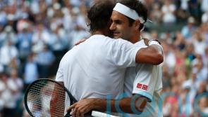 Roger and out: Rafael Nadal leads the tributes to a sporting great