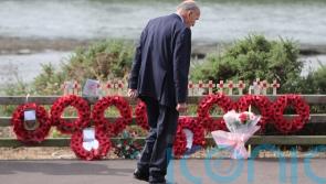 Desecration of wreaths and tributes at site of atrocity condemned
