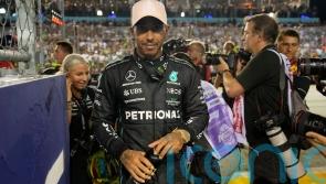 Lewis Hamilton escapes fine for wearing nose stud but Mercedes pay penalty