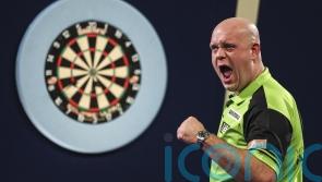 Michael van Gerwen holds off Nathan Aspinall comeback to win World Grand Prix