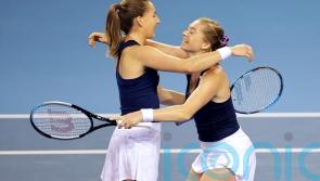 Britain beaten by Kazakhstan but doubles win keeps BJK Cup hopes alive