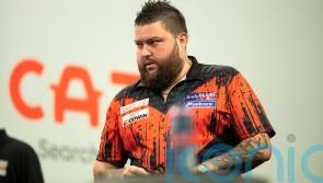 Michael Smith gets another shot at glory after toppling Raymond van Barneveld