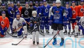 Young Ukrainian ice hockey fans train with Glasgow Clan