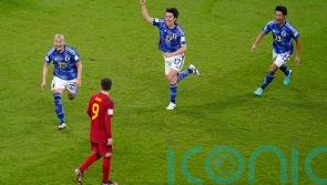 Japan come from behind to beat Spain and ensure World Cup progress