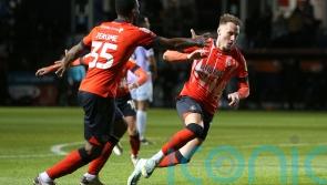 Substitute Cauley Woodrow scores late winner as 10-man Luton beat Norwich