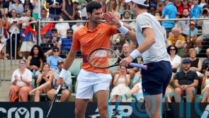 Novak Djokovic given warm welcome back to Australia in doubles defeat