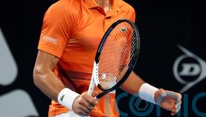 Novak Djokovic battles back from the brink to lift Adelaide title