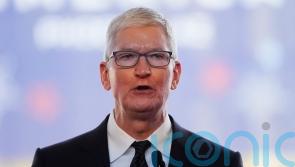 Apple CEO Tim Cook to take more than 40% pay cut