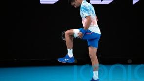 Djokovic taking hamstring injury &lsquo;day to day&rsquo; as he progresses in Melbourne