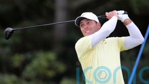 Francesco Molinari rediscovers form to claim share of lead in Abu Dhabi