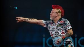 Peter Wright holds off Gerwyn Price to claim Nordic Masters title
