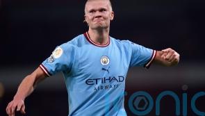 Erling Haaland wraps up win as Man City beat Arsenal to go top of Premier League