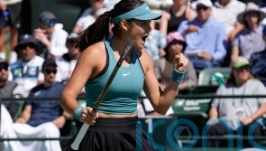 Emma Raducanu digs deep to reach last 16 at Indian Wells