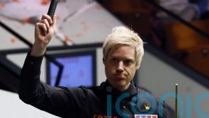 Former champion Neil Robertson reaches round two at Crucible by beating Wu Yize