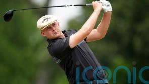 Harry Hall bounces back from double blow to keep share of lead