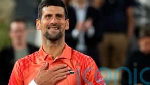 Novak Djokovic keeps focus on court to see off Marton Fucsovics at French Open