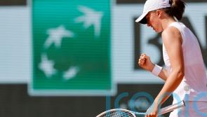 French Open day five: Iga Swiatek eases through as Daniel Altmaier shocks Sinner