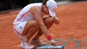 Iga Swiatek digs deep to beat Karolina Muchova and win third French Open title