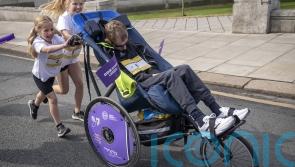 Rob Burrow pushed around Leeds fun run course by daughters on Father&rsquo;s Day