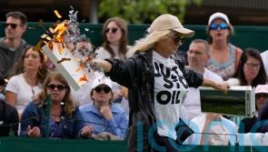 Arrests made after two Just Stop Oil protesters disrupt play at Wimbledon