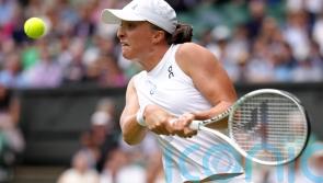 Iga Swiatek breezes through while Ukraine&rsquo;s Marta Kostyuk fights back to win