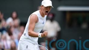 Iga Swiatek saves two match points to reach first Wimbledon quarter-final