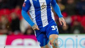 Wigan no longer on minus points after thrashing leaders Bolton