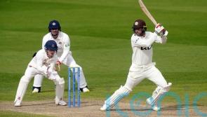 Surrey stay on course for another title with commanding win over Warwickshire