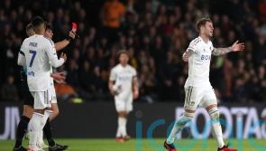 Joe Rodon sent off as Leeds hang on for draw at Hull