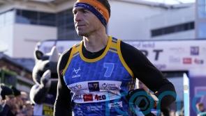 Kevin Sinfield greeted by Sir Gareth Edwards after latest fundraising challenge