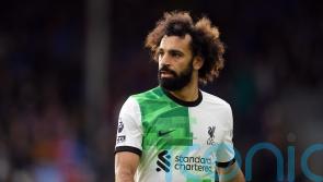 Salah happy with record-breaking goal but has sights set on Premier League title