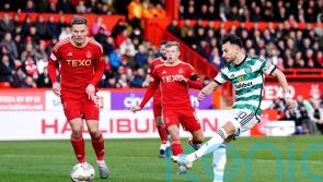 New signing Kuhn rescues point for Celtic as fans protest at transfer business