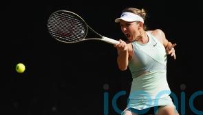 Simona Halep beaten despite strong start in first match back from doping ban